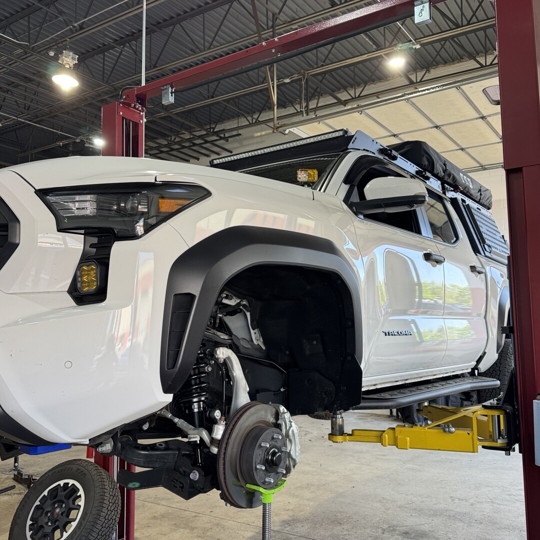 Toyota Tacoma receiving suspension service at Bull Run 4x4