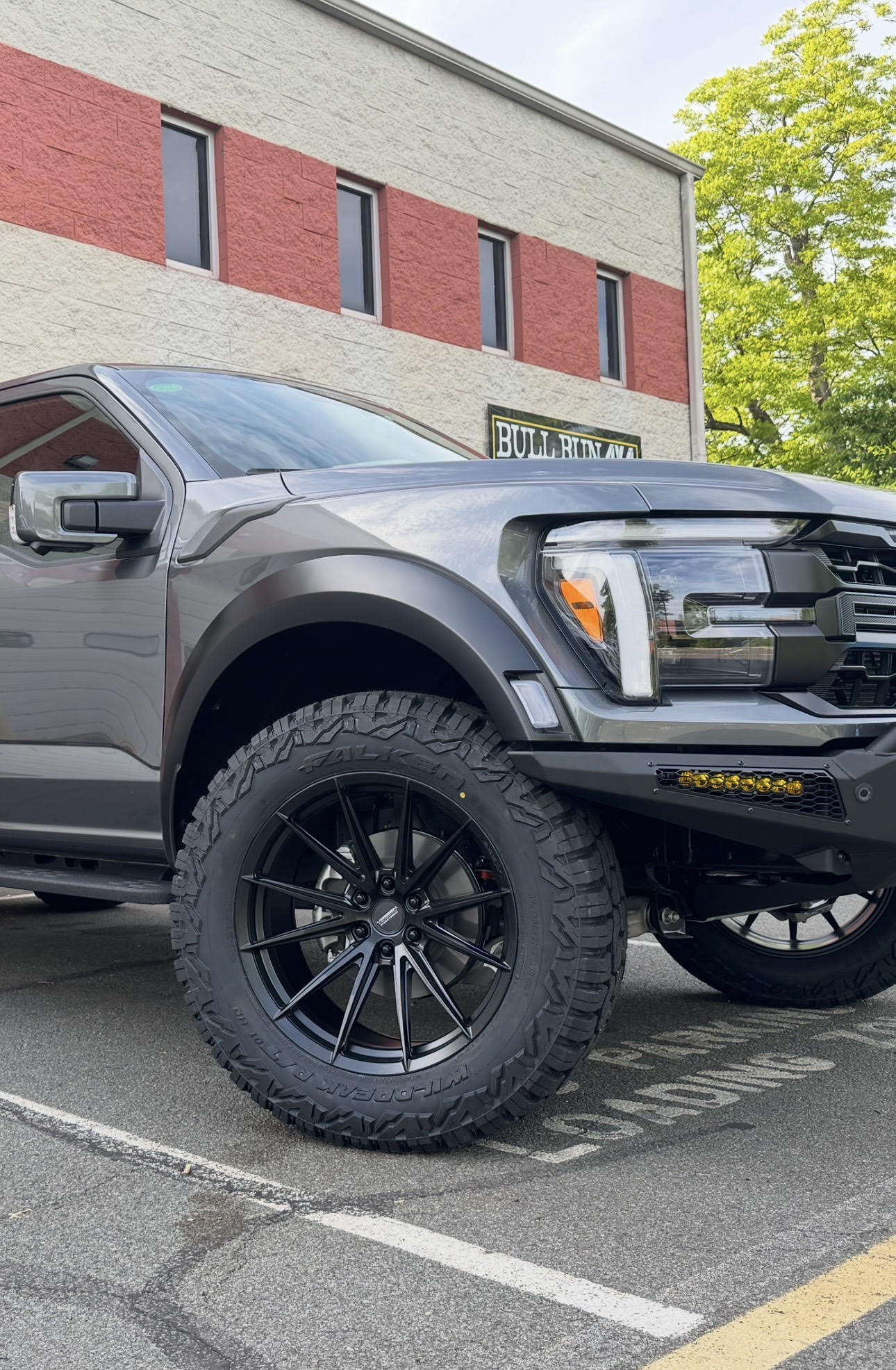Ford Raptor wheel and Falken all-terrain tire installed at Bull Run 4x4